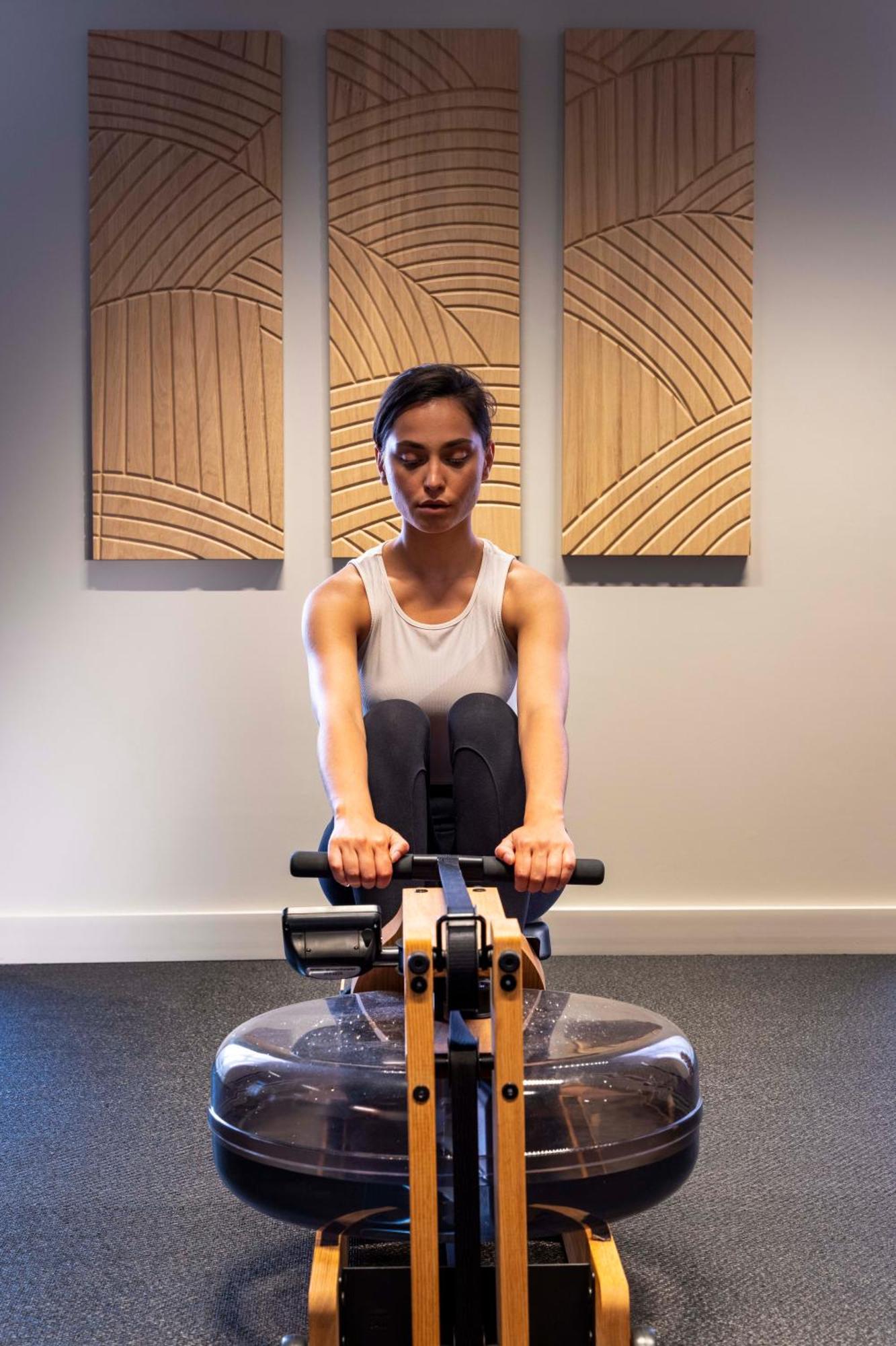 Maison Rouge Strasbourg Hotel & Spa, Autograph Collection Exterior photo A woman on a rowing machine