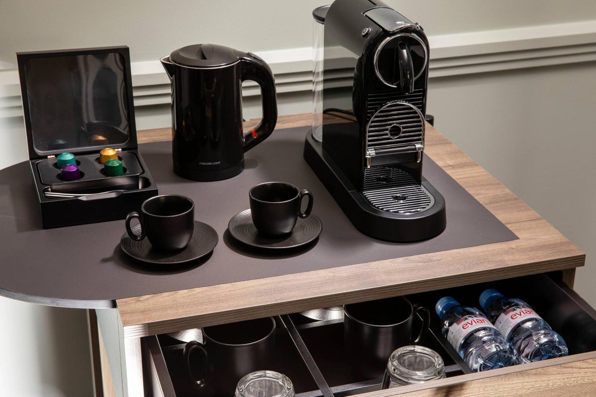 Maison Rouge Strasbourg Hotel & Spa, Autograph Collection Exterior photo A Nespresso coffee machine in a hotel room